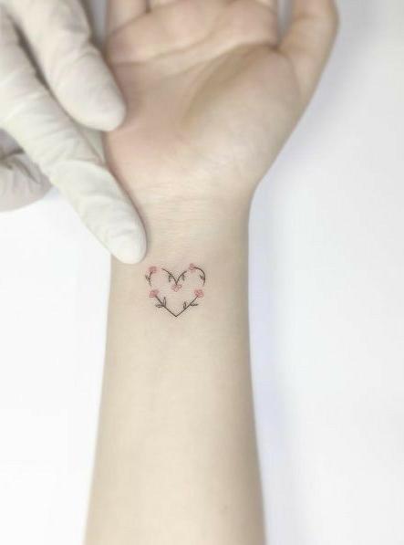 Small Heart Tattoo With Roses