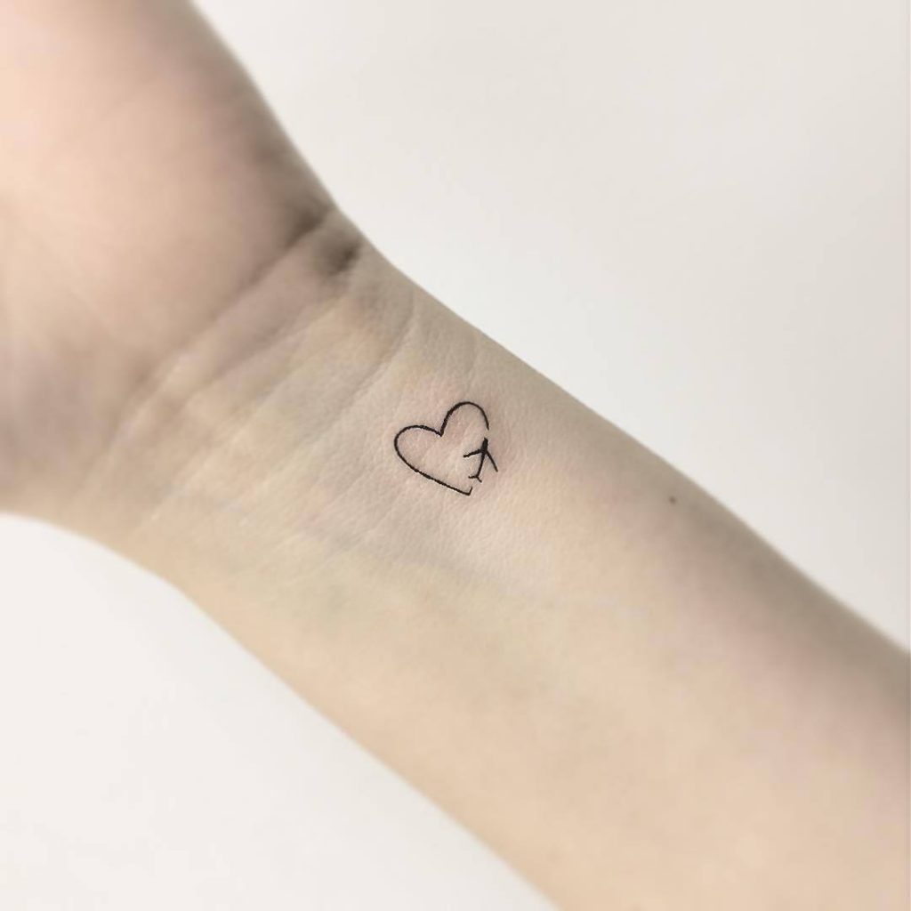 Tiny Heart Tatoo On Wrist