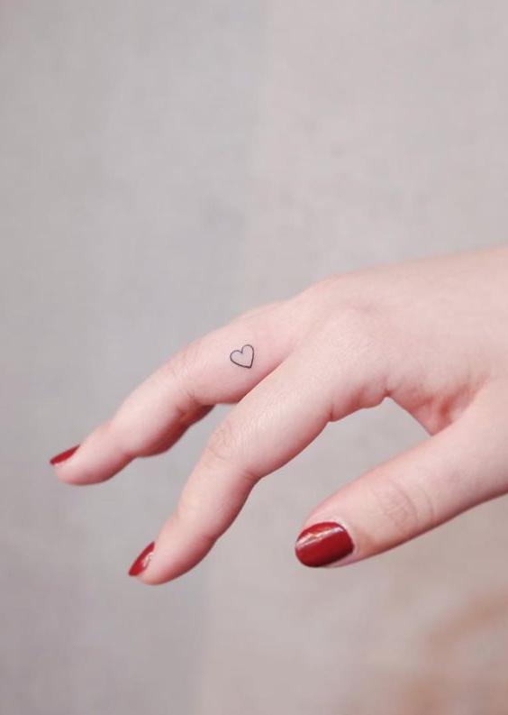 Tiny Linework Heart Tattoo on Finger